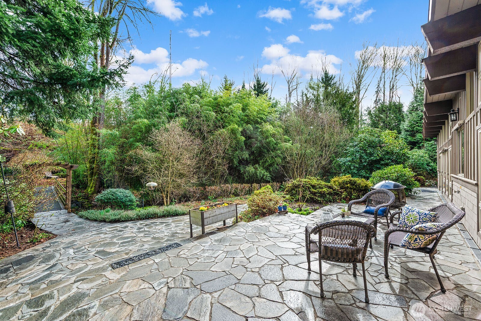 Large private patio ideal for entertaining, outdoor meals, birdwatching, or just sitting to listen to the creek. Another space with endless possibilities!