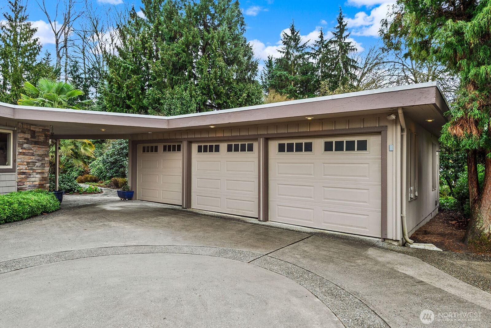 Three-car garage with extra storage.