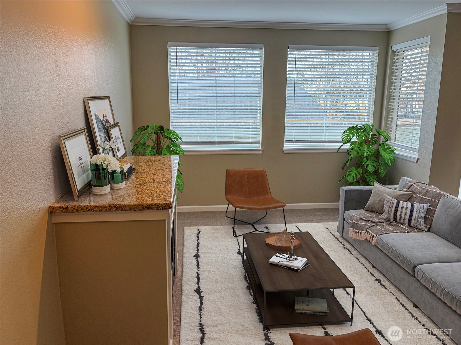 (Virtually Staged) Light-filled living area with oversized windows, neutral palette, and an open-concept layout ideal for entertaining.