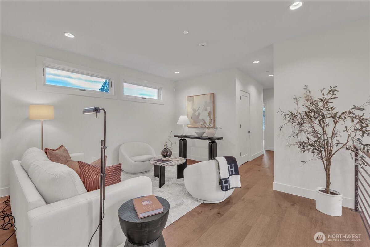 Upper level loft! Perfect space for playroom or den.