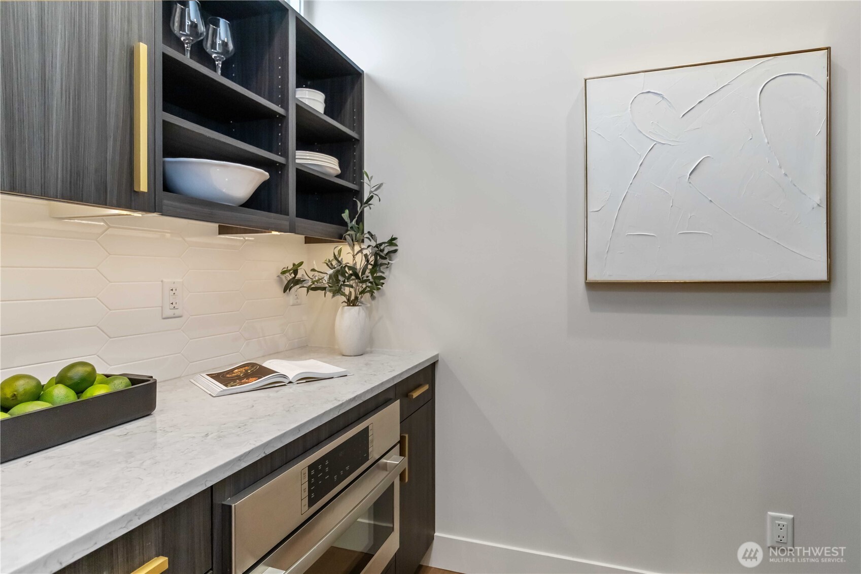 Nicely appointed butlers pantry in your chefs kitchen.