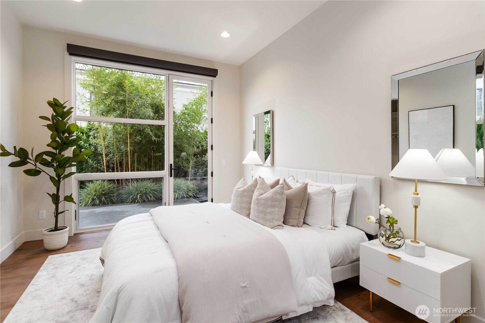 Main level flex room! Makes for perfect bedroom or home office.