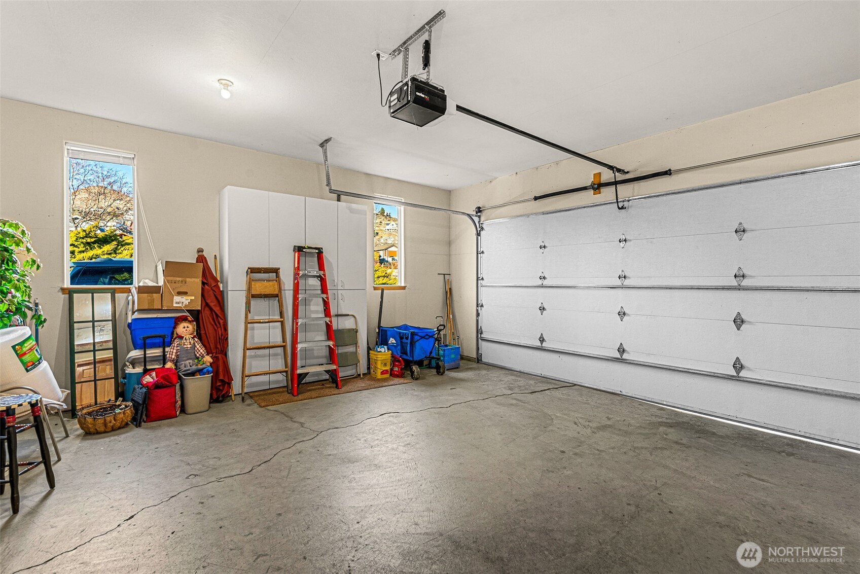 Large double car garage with storage units
