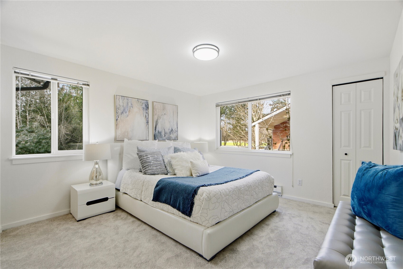 Spacious primary bedroom with great natural light