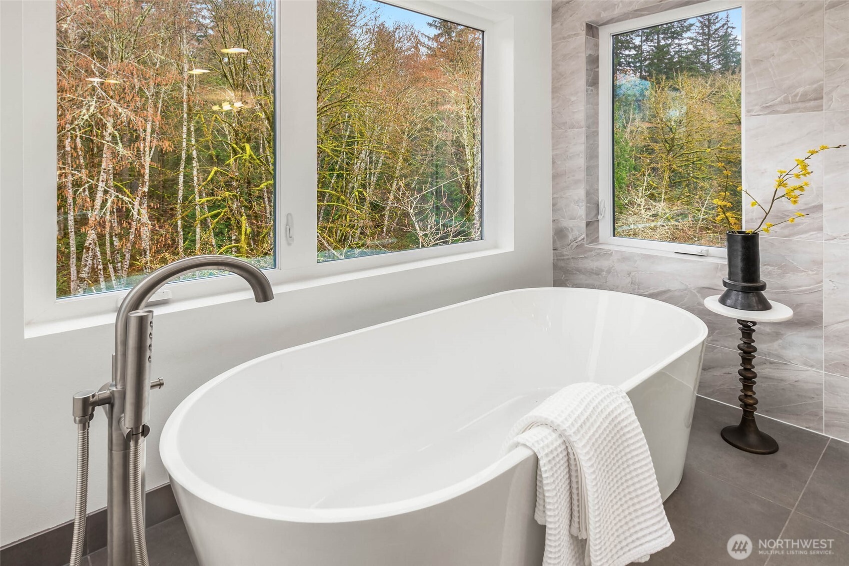 Free standing soaking tub with greenbelt outlooks truly spa like