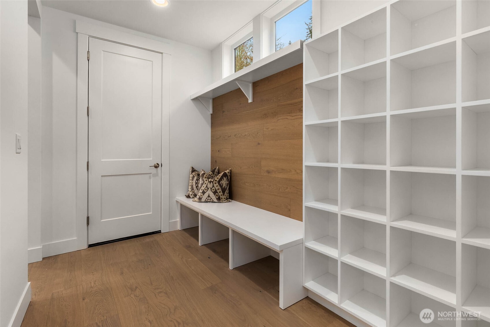 Mudroom conveniently connects garage and kitchen