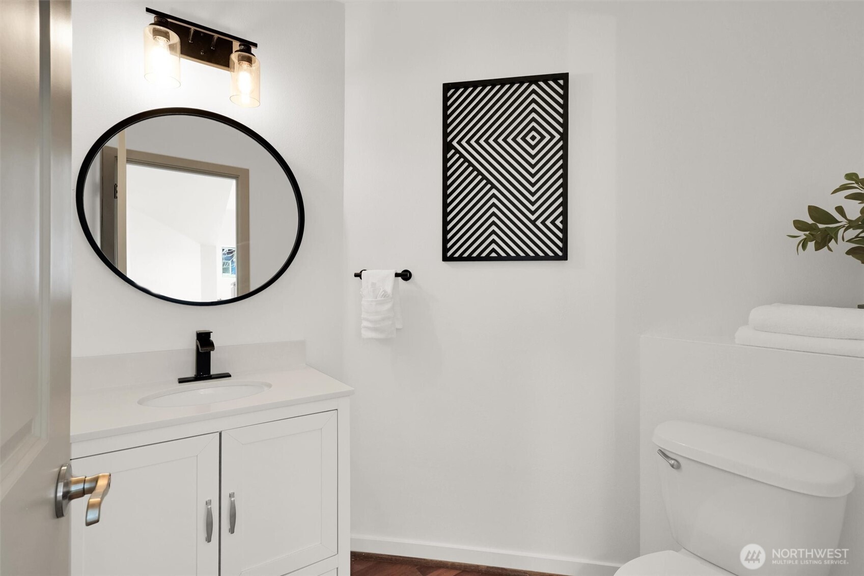 Updated guest bathroom with modern finishes and clean design.