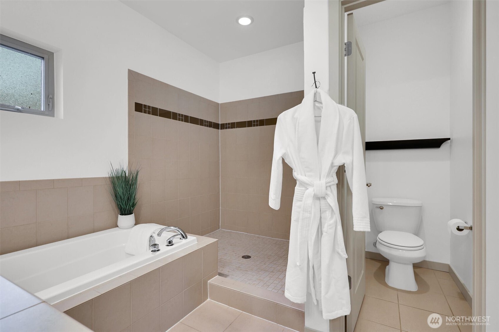 Well-designed bathroom with a functional layout.