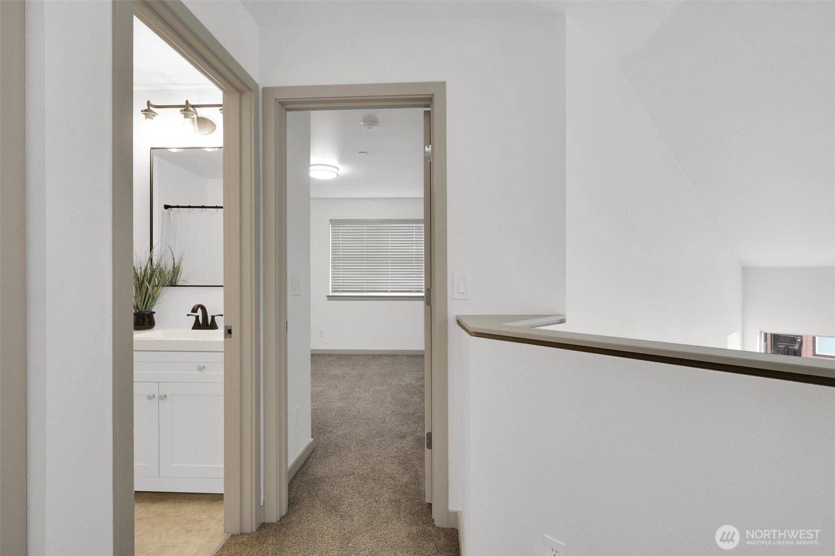 Upper hallway with great light and thoughtful layout.