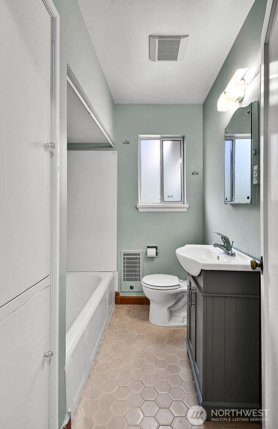 Bathroom with built-in storage.