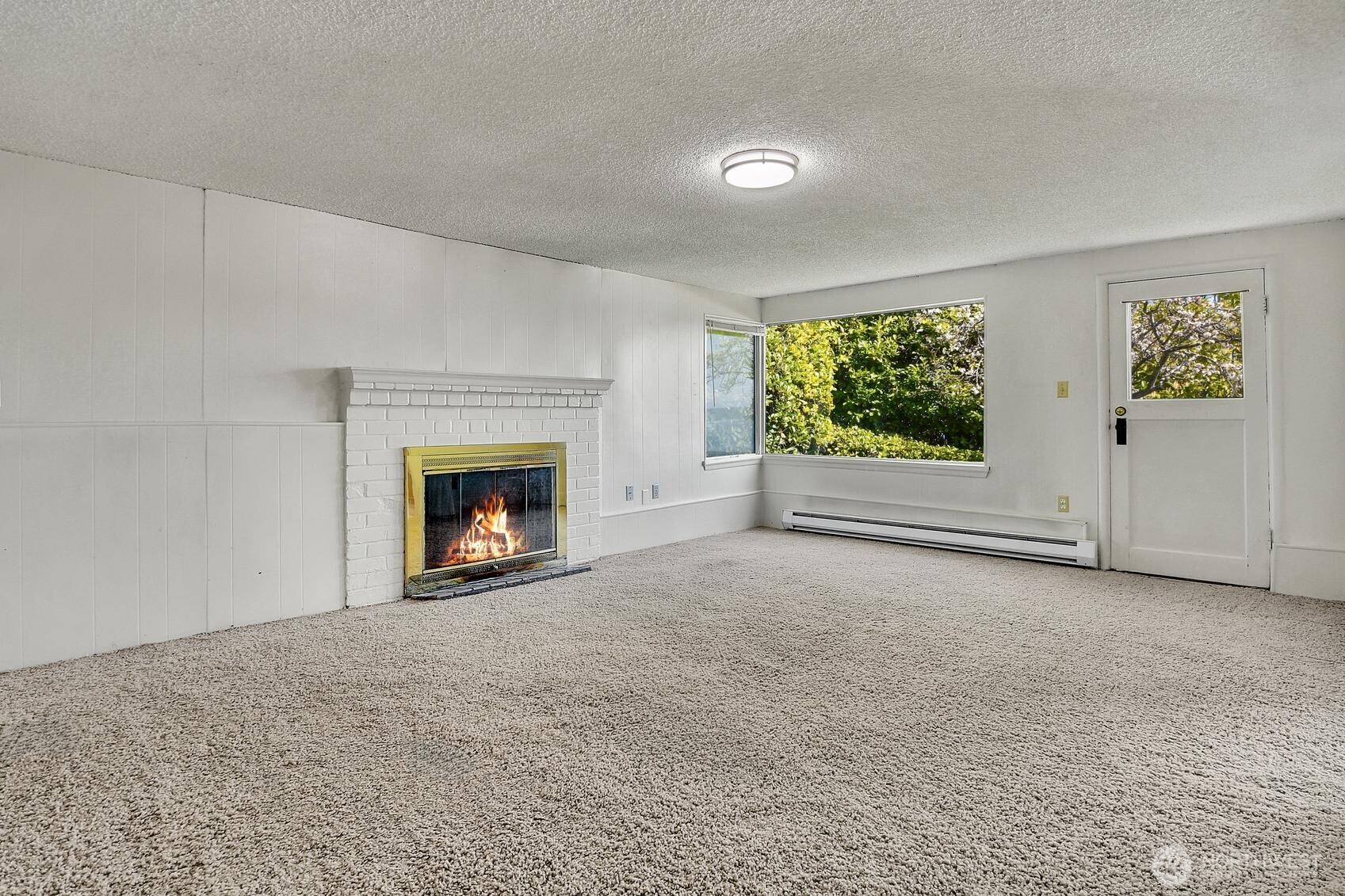 The lower level living room with fireplace.