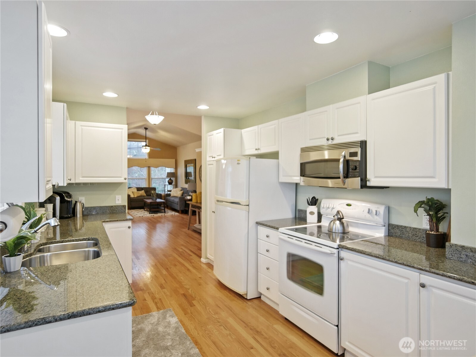 A well designed kitchen with plenty of counter space and storage.