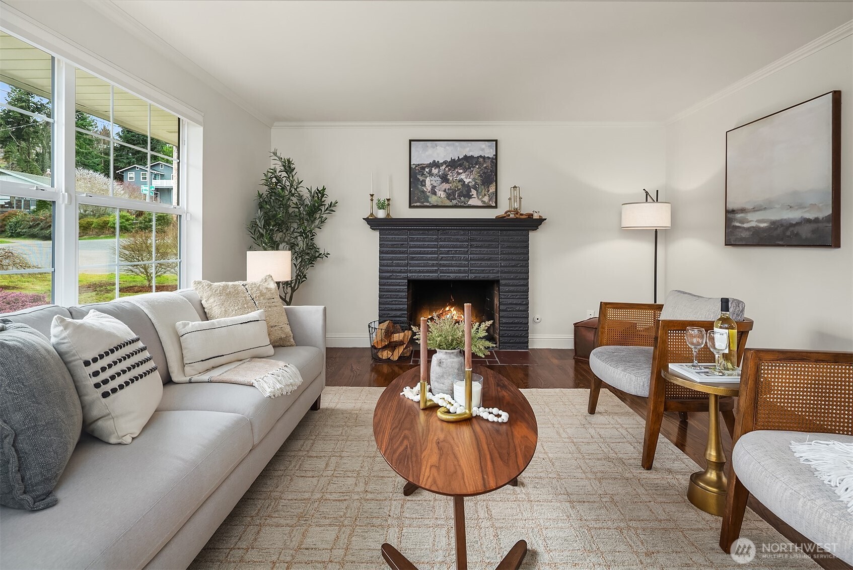 Living space with large windows allowing abundant natural light throughout.