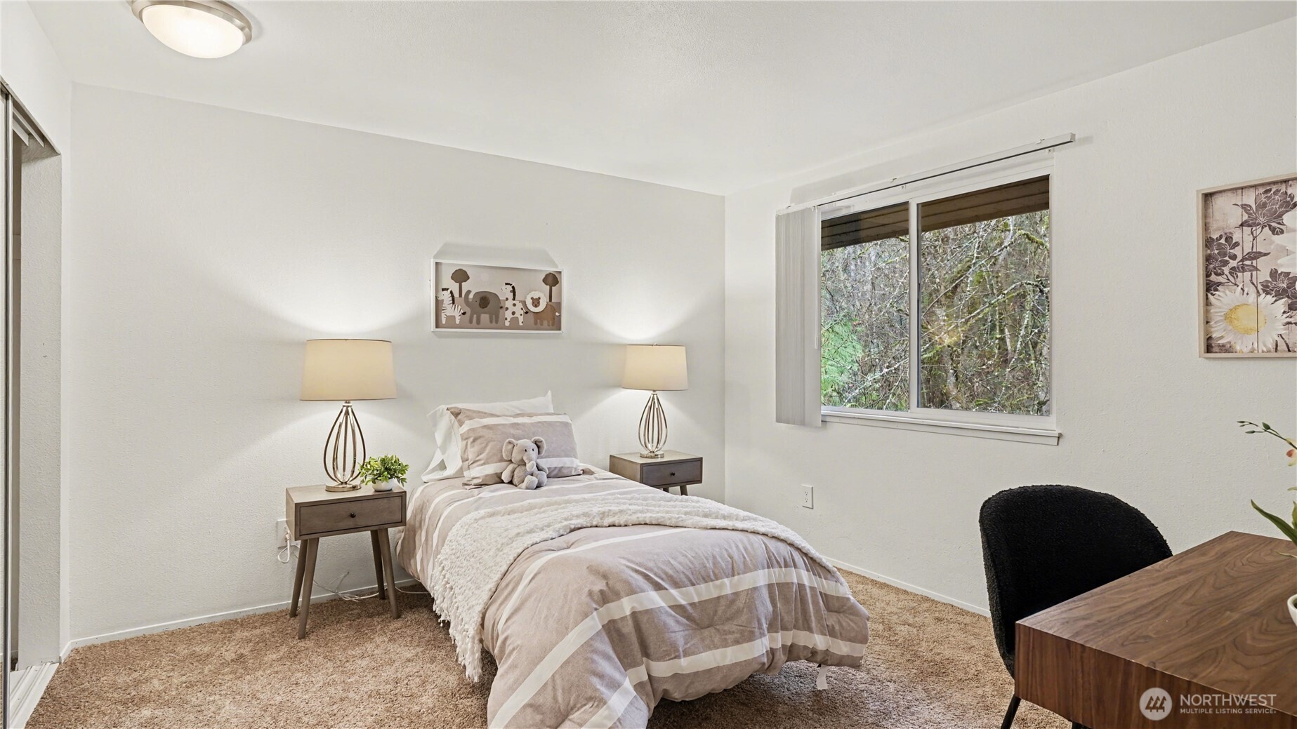 Spacious second bedroom next to upstairs bath.