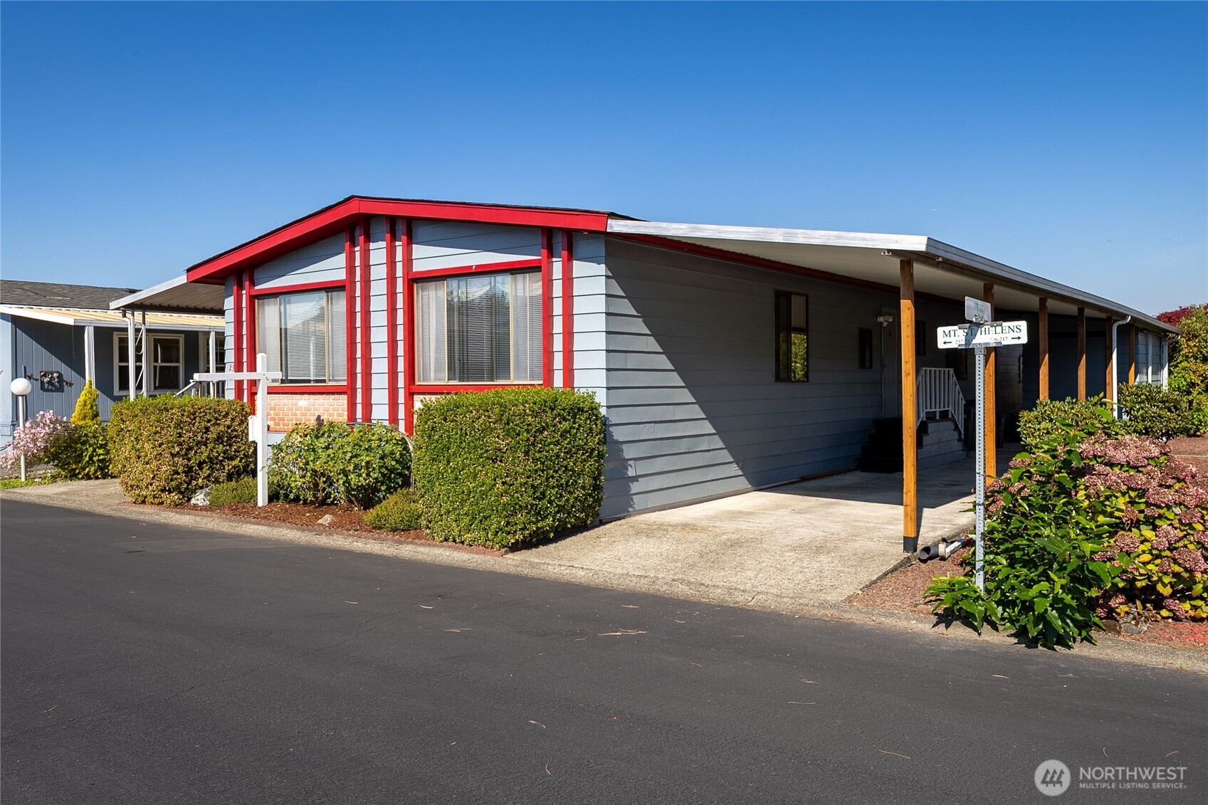 #237 with large carport and big shed with electricity and lights. Perfect for project, gardening tools and extra storage!