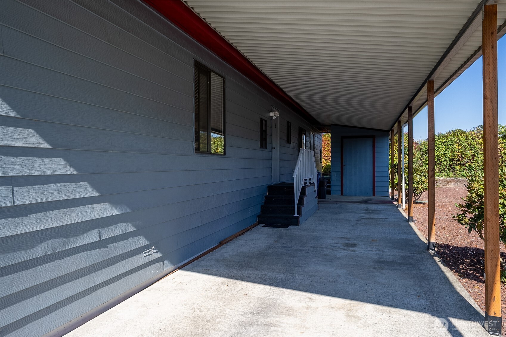 Extra large carport and nice big shed with electricity and lights!