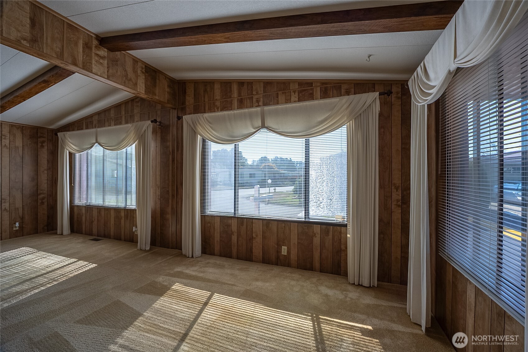 Living Room.  Double windows through out home,