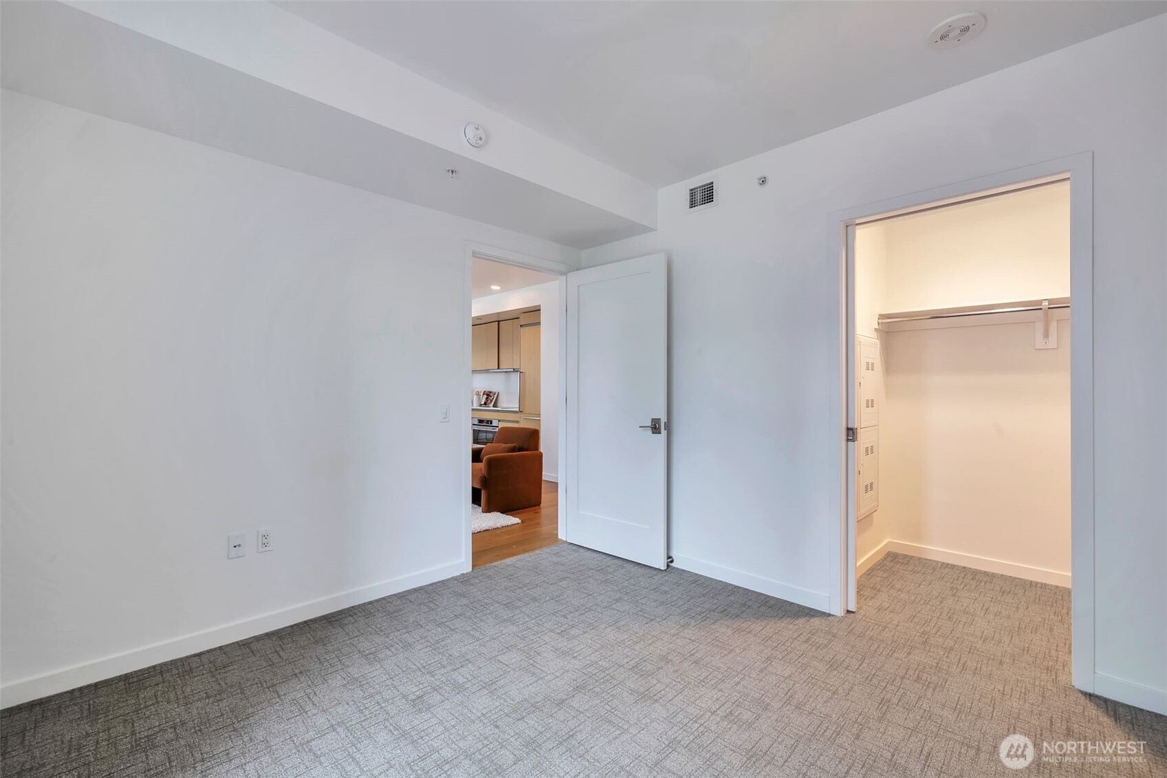 2nd bedroom with a walk-in closet