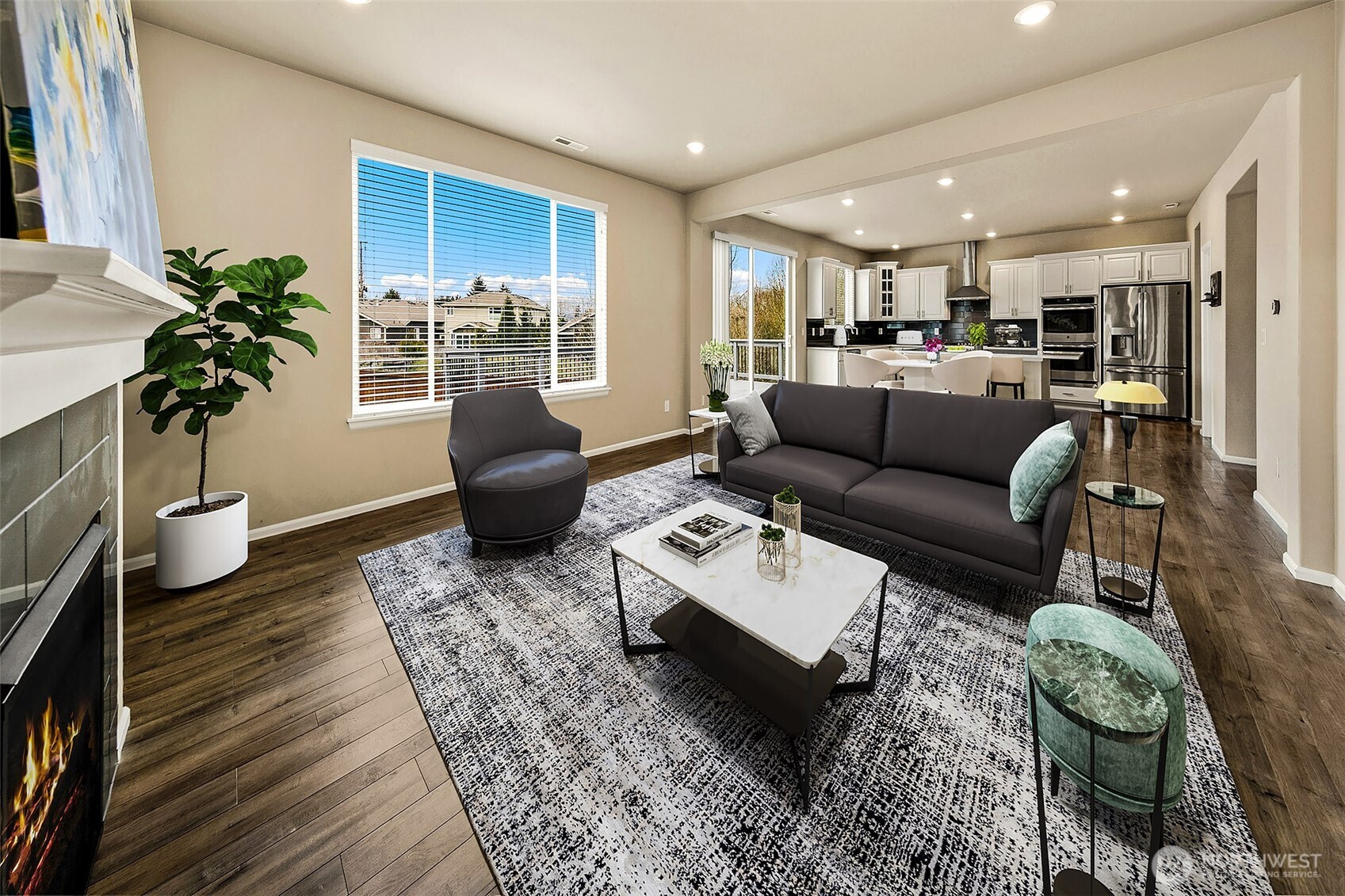 Living room with gas fireplace. This photo has been virtually staged.