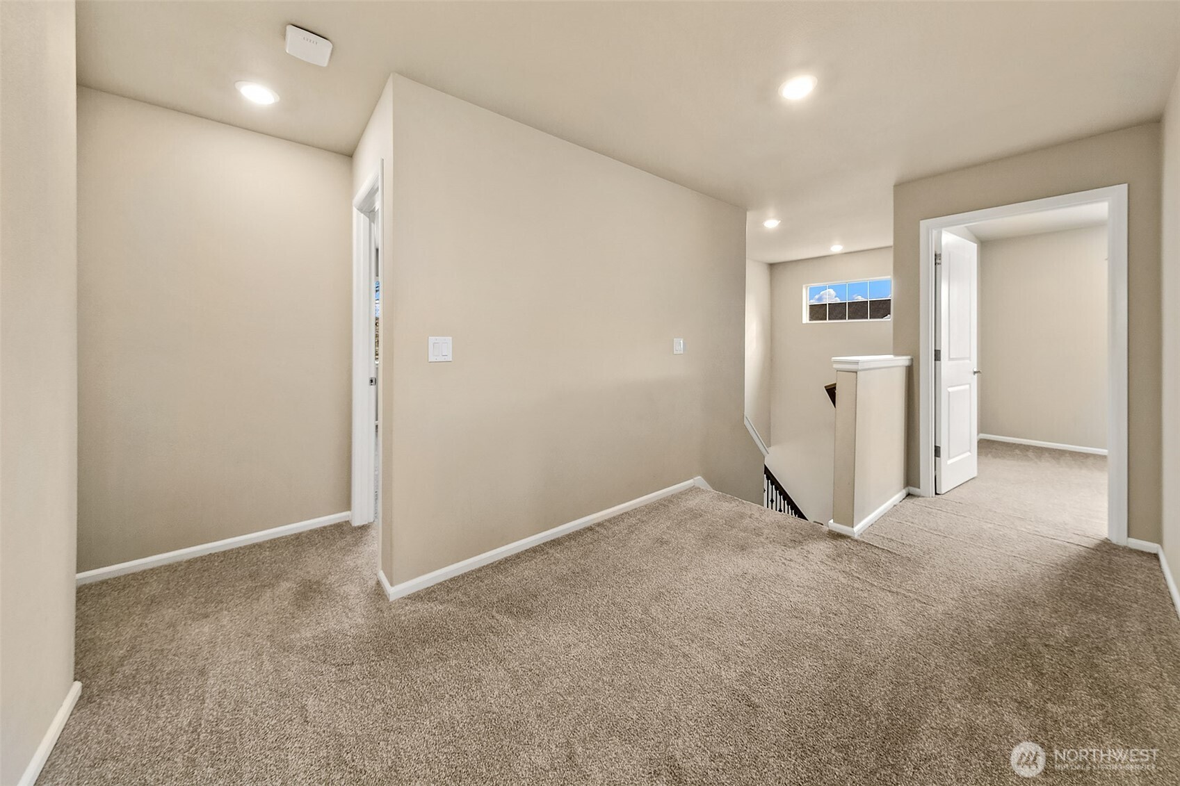 Loft area on the second floor near the bedrooms.