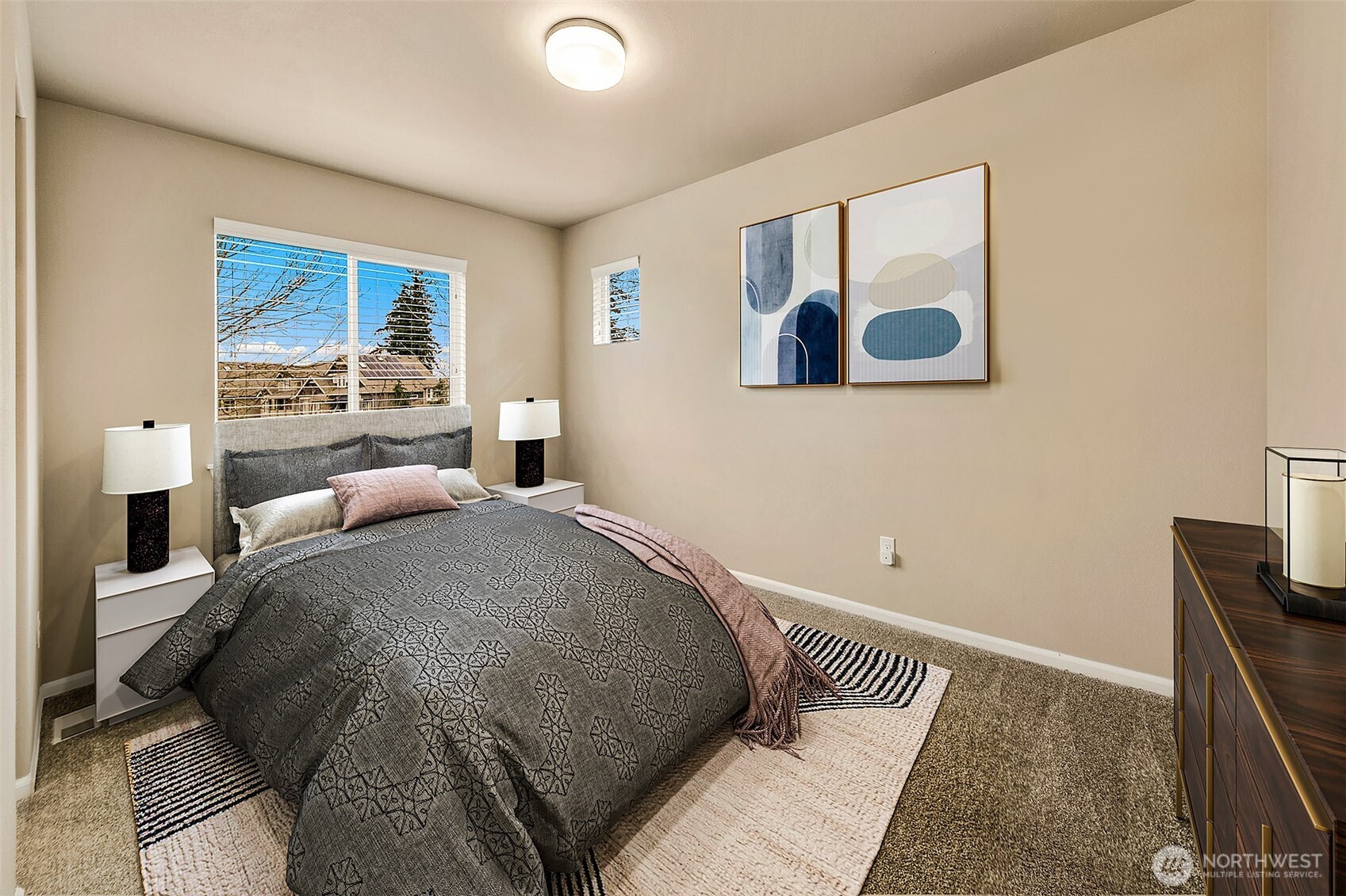 One of the bedrooms sharing the Jack-n-Jill bathroom. This photo has been virtually staged.
