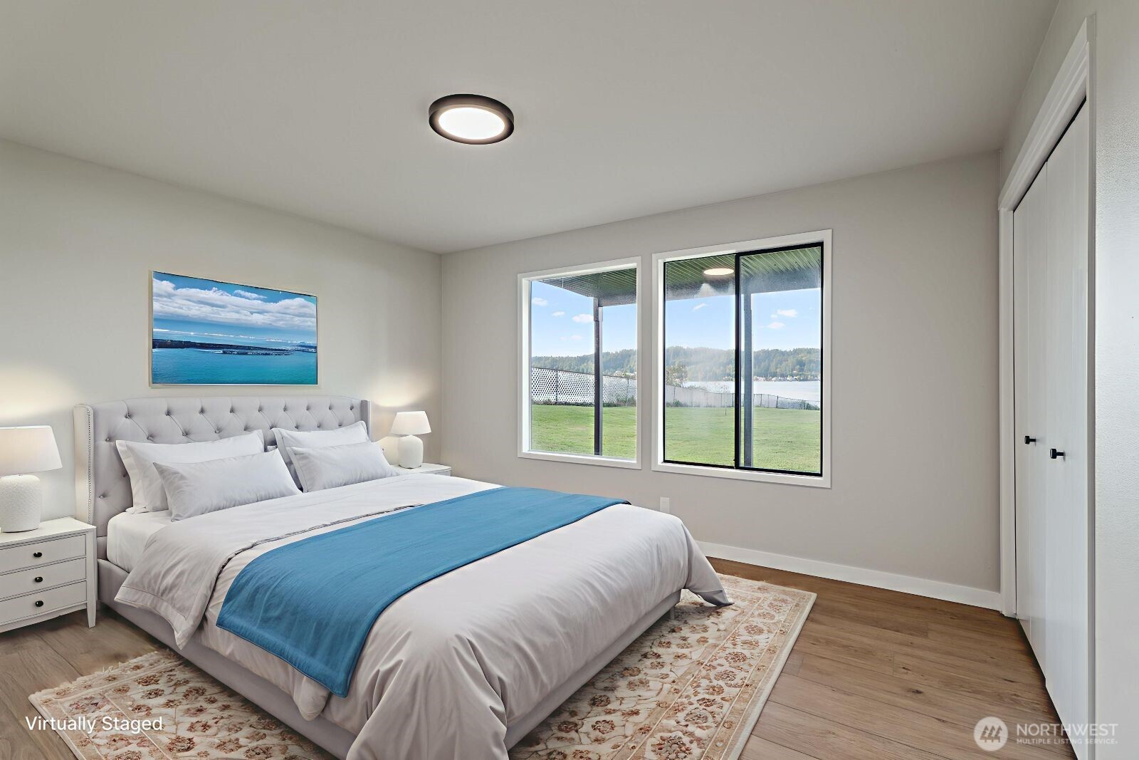 downstairs bedroom facing the lake virtually staged