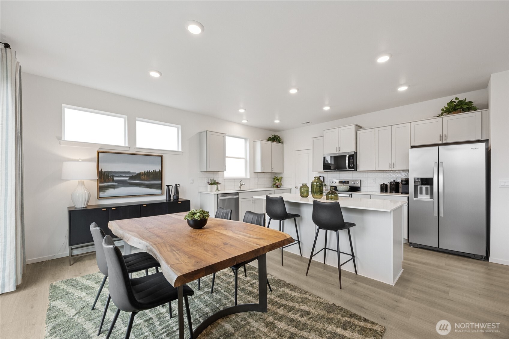 Big slider to the spacious backyard provides lots of light into your home.  Pictures are for representational purposes only, colors and features may vary.