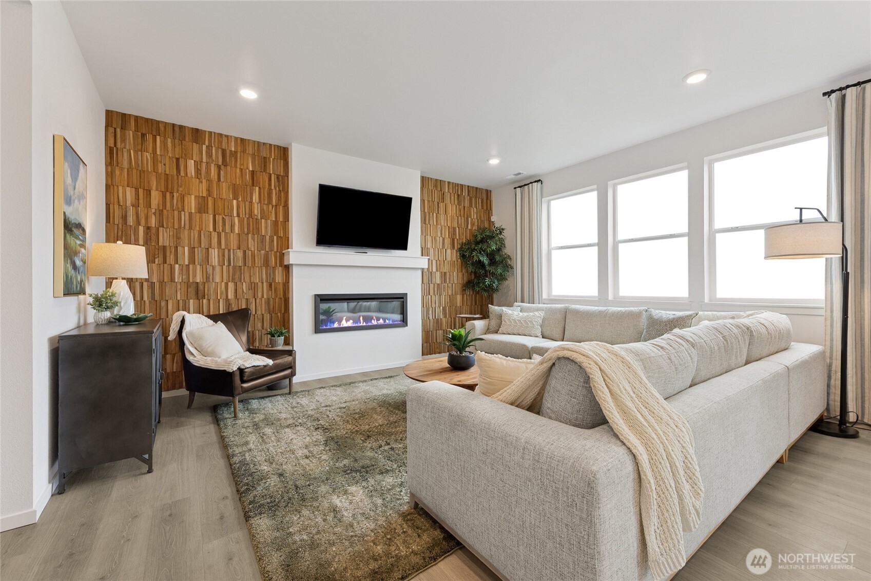 Light and bright family room.  Pictures are for representational purposes only, colors and features may vary.