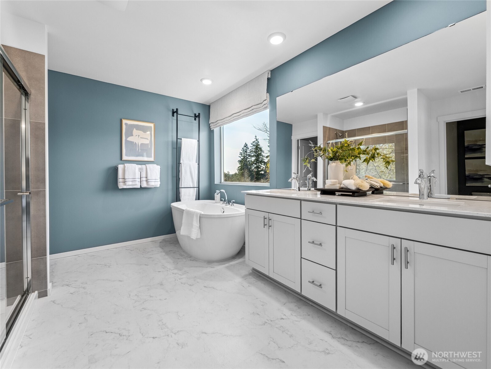 Primary bathroom with dual sinks, soaking tub, shower, and separate toilet room.  Picture for representational purposes only, colors and features may vary.