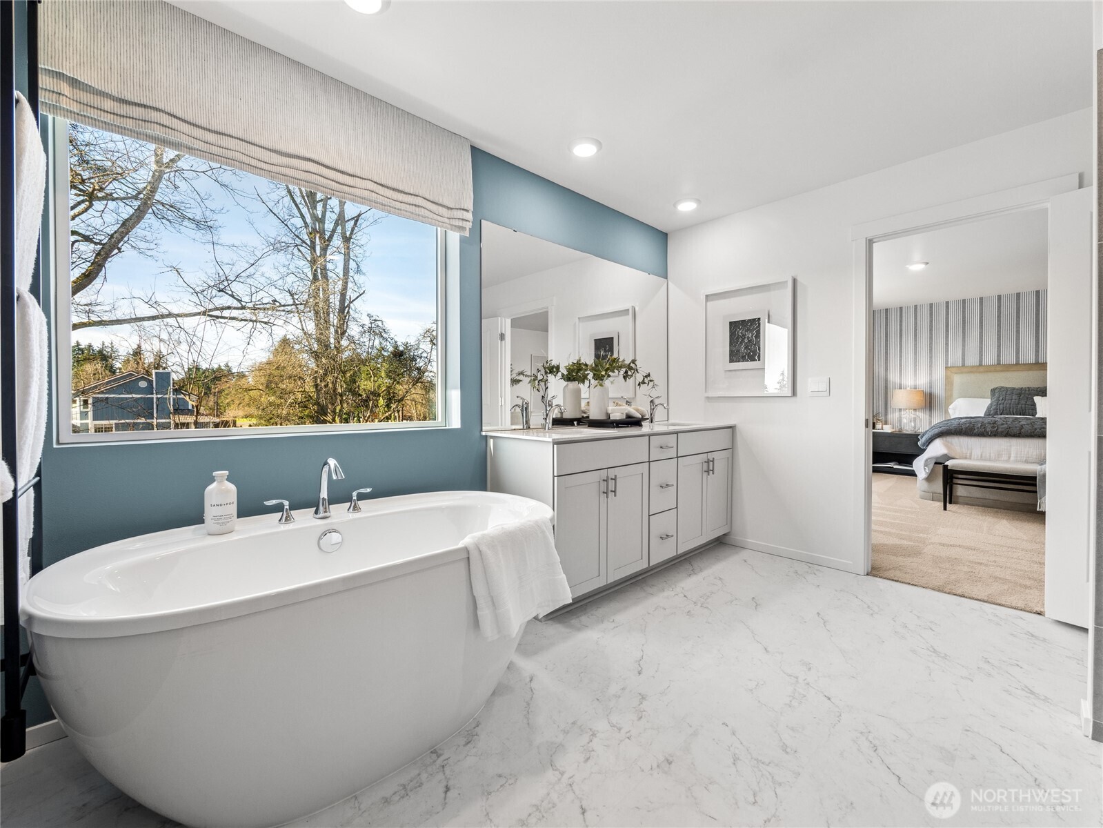 Great light in your primary bathroom!  Picture for representational purposes only, colors and features may vary.