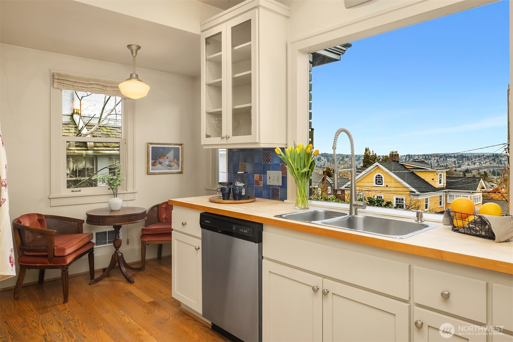 Walk in pantry and casual eating area in the kitchen with views facing north.
