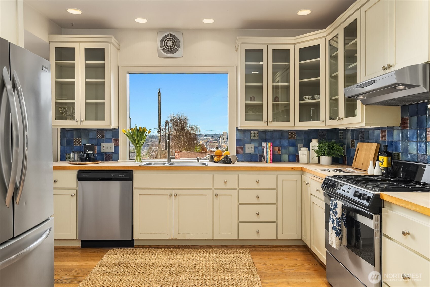Large kitchen with a walk in pantry and eating nook.