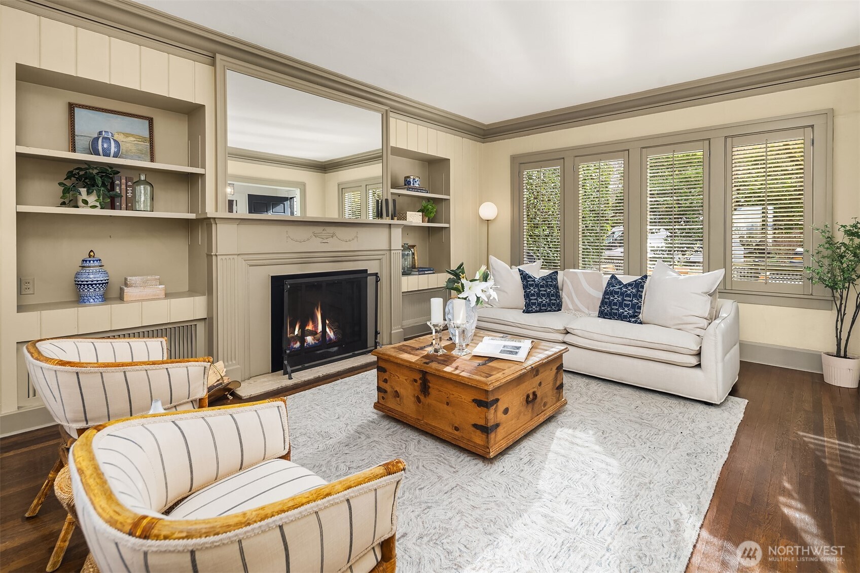 Living room faces south into the fenced in yard and front patio.