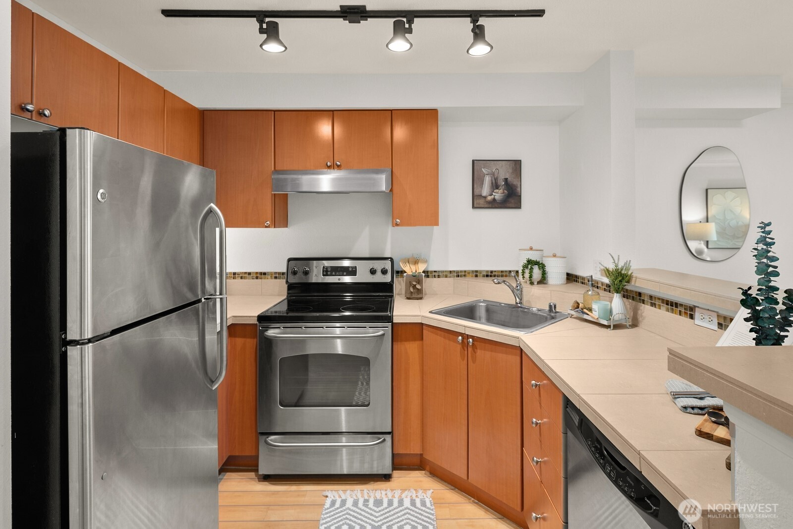 Open-Concept kitchen with GE stainless appliances