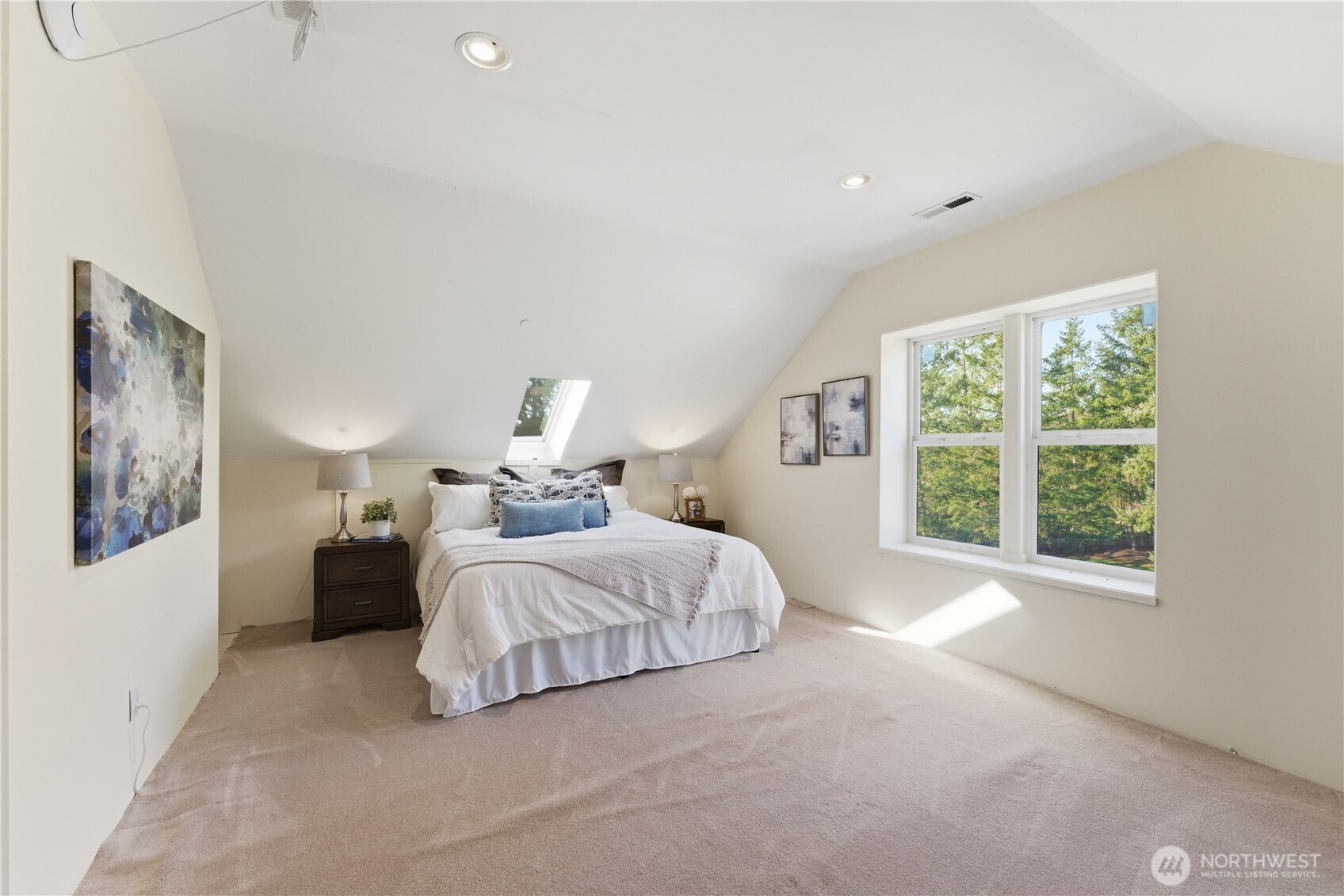 The north unfinished bedroom includes electrical, central vacuum, two skylights with electric shades, a large double-hung window, and plumbing roughed-in for a bathroom