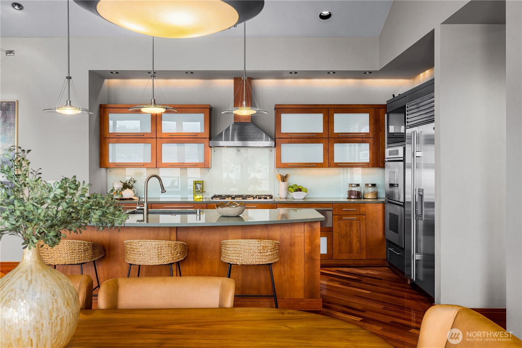 Designed for gathering—an open, light-filled space where kitchen, dining, and living come together effortlessly.