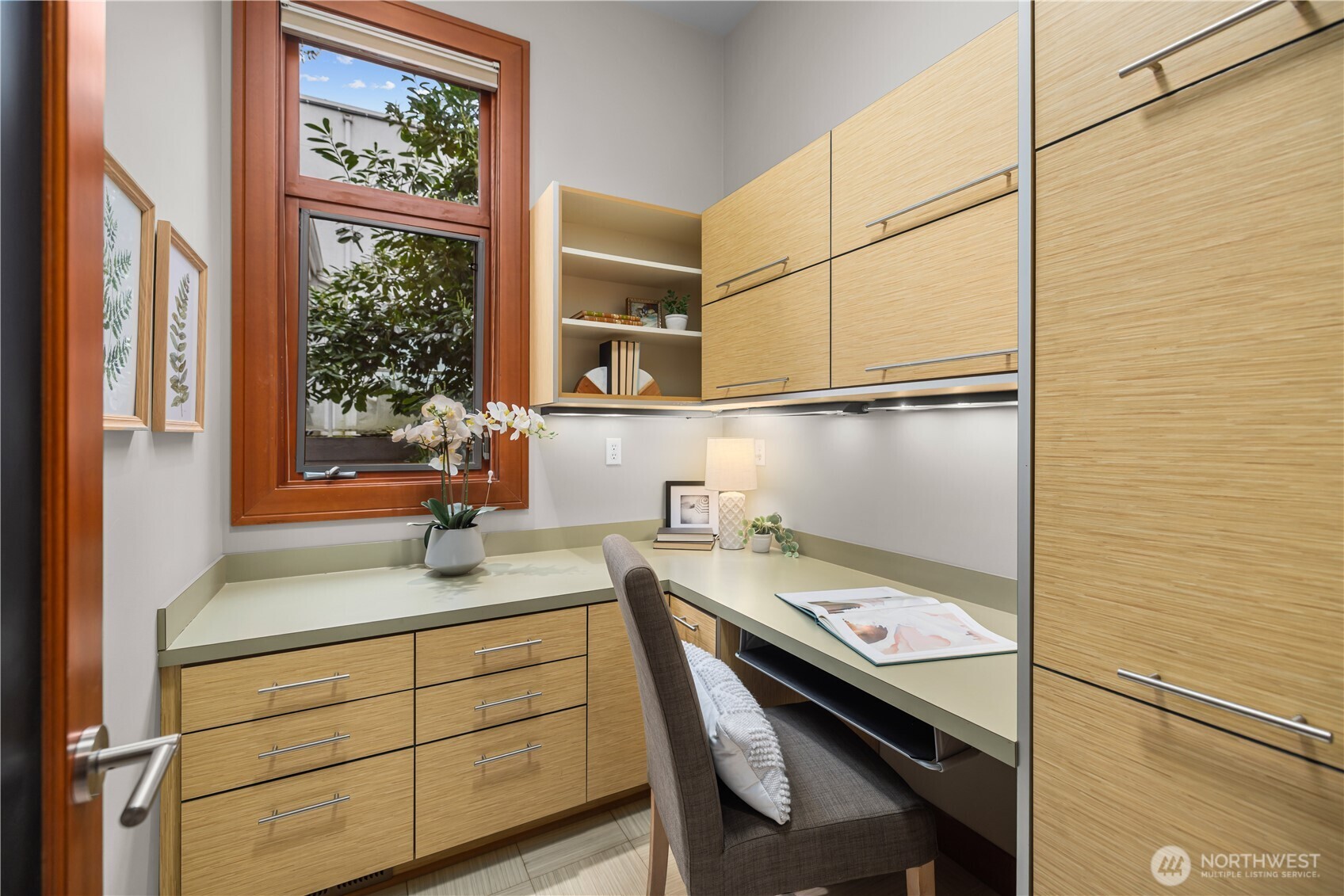 Tucked just off the main living space, this butler’s pantry adds both function and flow—ideal for prep, service, and everyday ease.