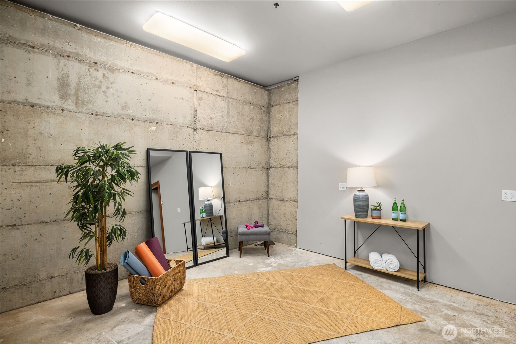 A refined lower level powder room with custom finishes, statement tilework, and warm wood elements that elevate the space.