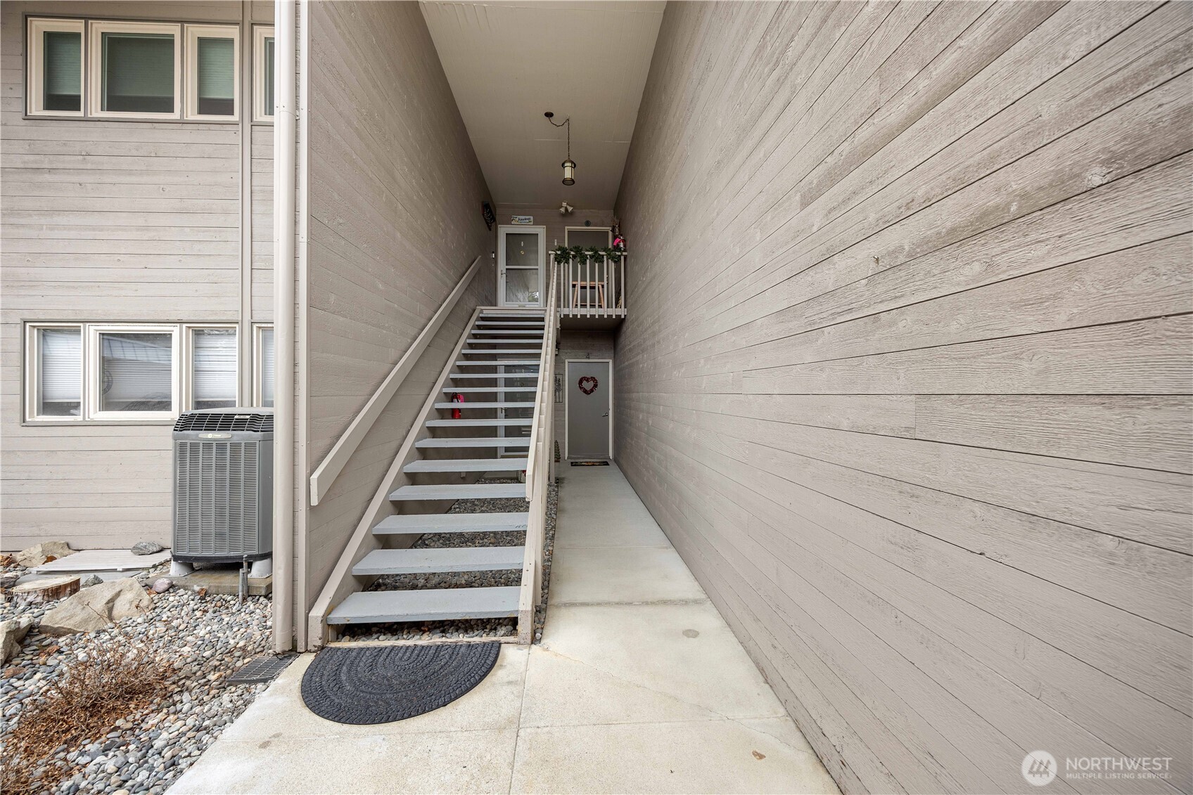 There are 8 units in this complex, each level has 4 units with entries on each end of the building looking similar to this....two up and two down.