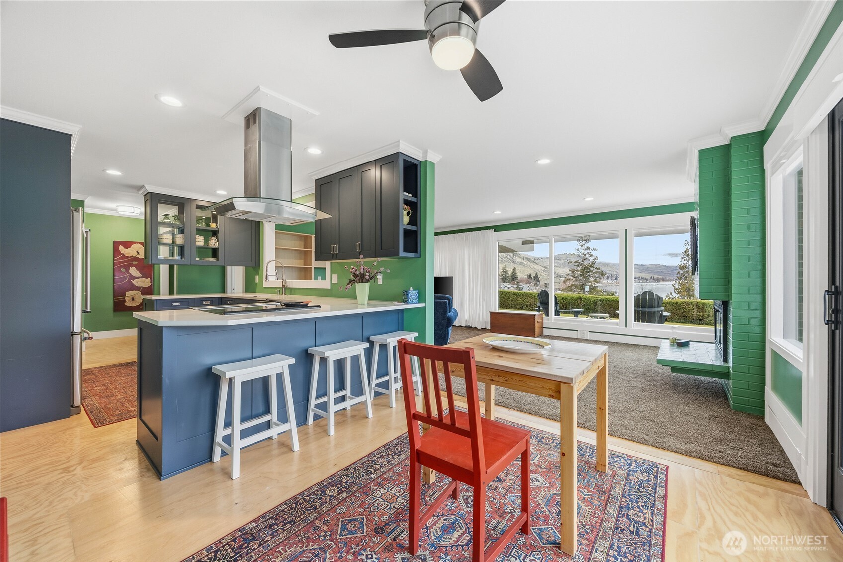 Additional eating space at kitchen counter is  necessary to engage with the "cook" and offer advice!