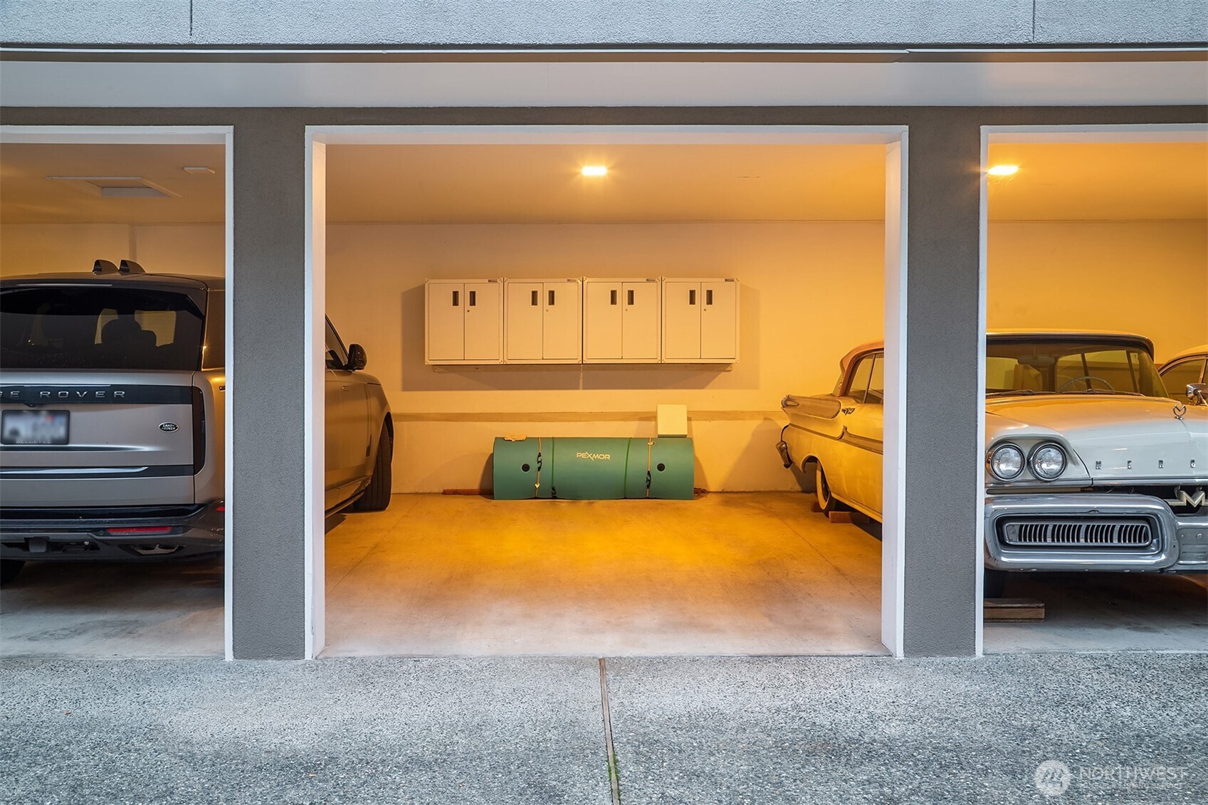 Covered space #2 with cabinetry storage  There is an additional uncovered parking space outside