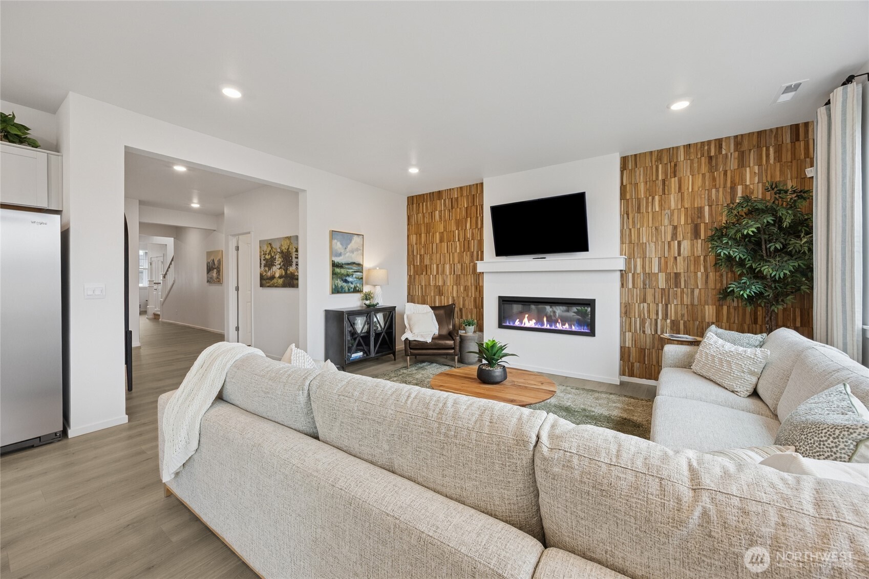 A lot of natural light floods the living area.  Pictures are for representational purposes only, colors and features may vary.