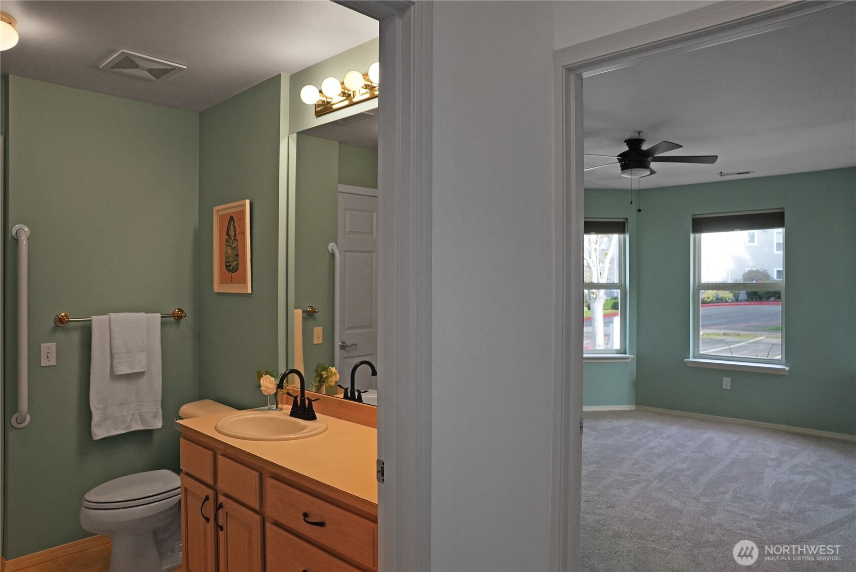Spacious Primary Bedroom - Large Window to bring in lots of light.