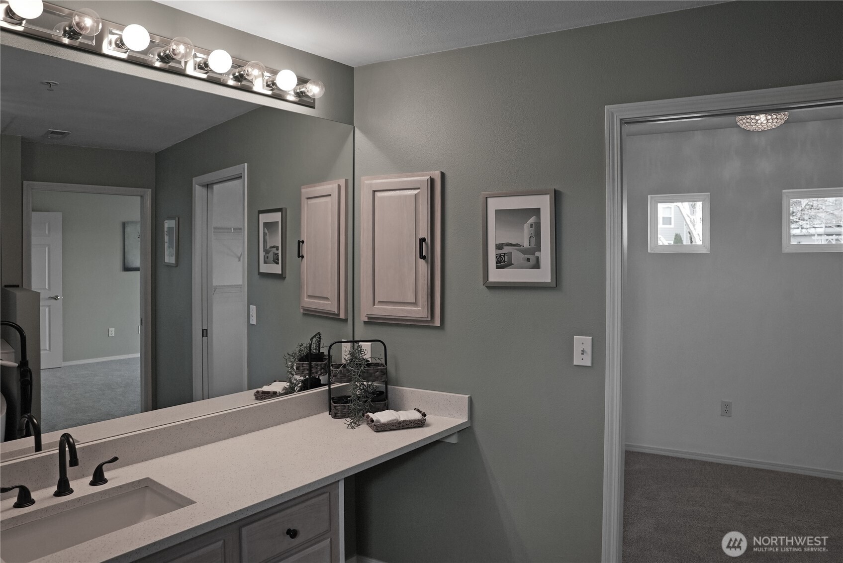 Primary Bathroom leading to Walk-in Closet.
