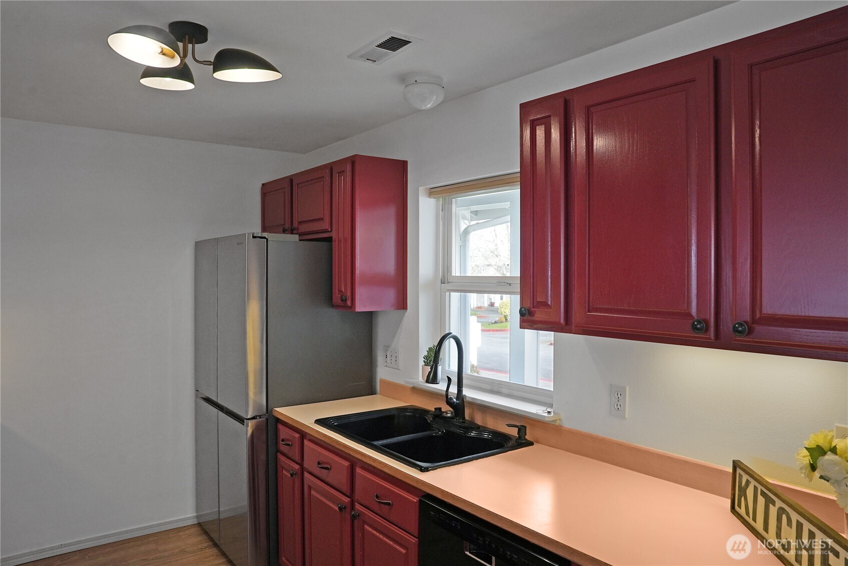 Kitchen with newer Stainless-Steel Appliances.