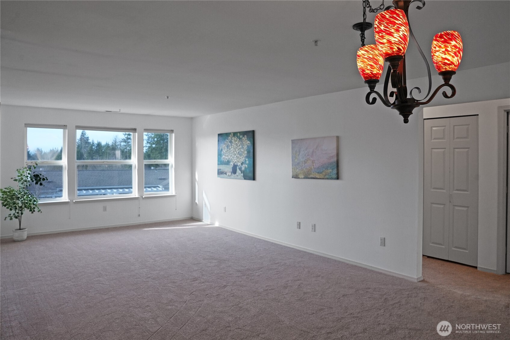 Spacious Living and Dining area with Large Windows to let in the Natural Light.