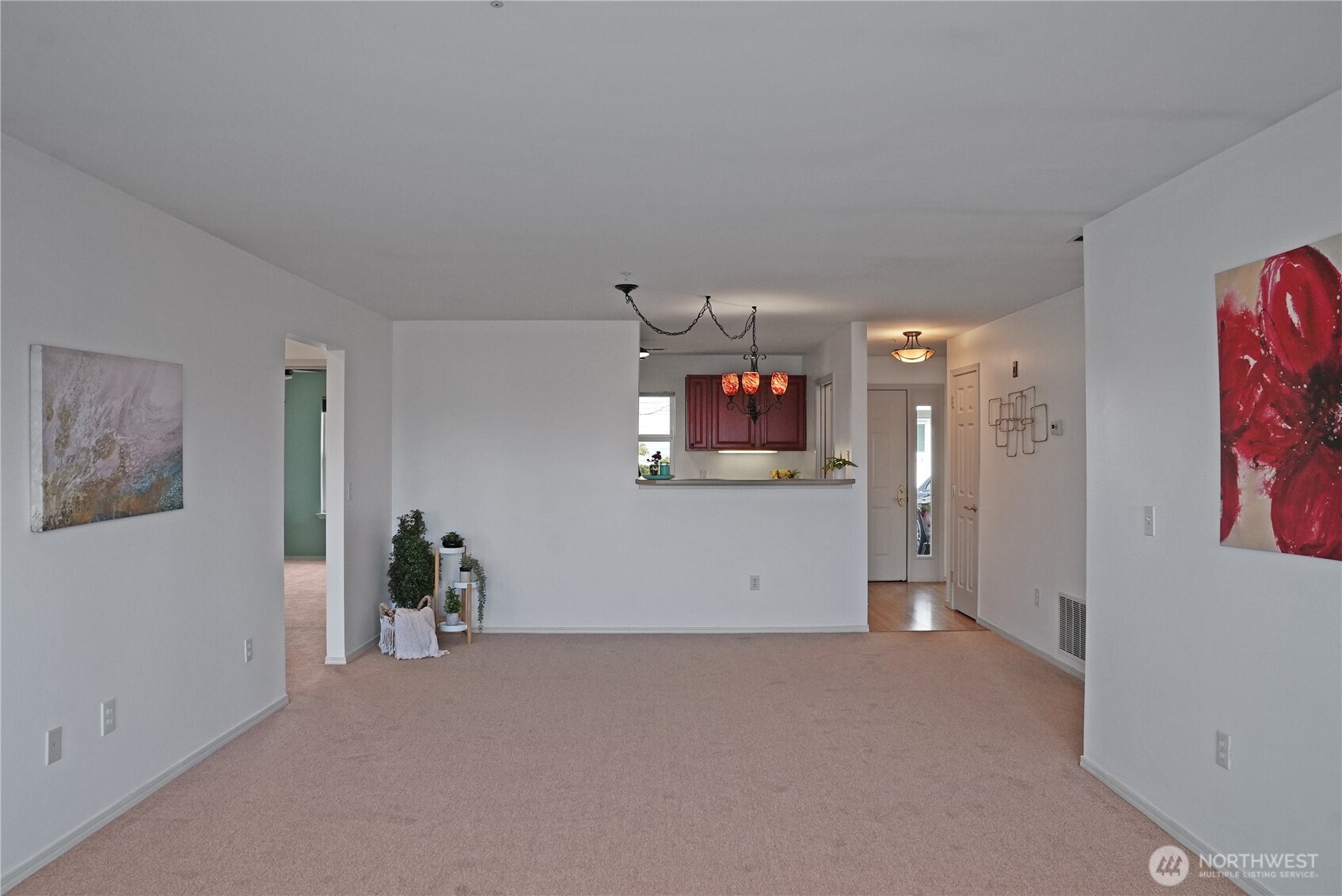 The kitchen connects to the living room!