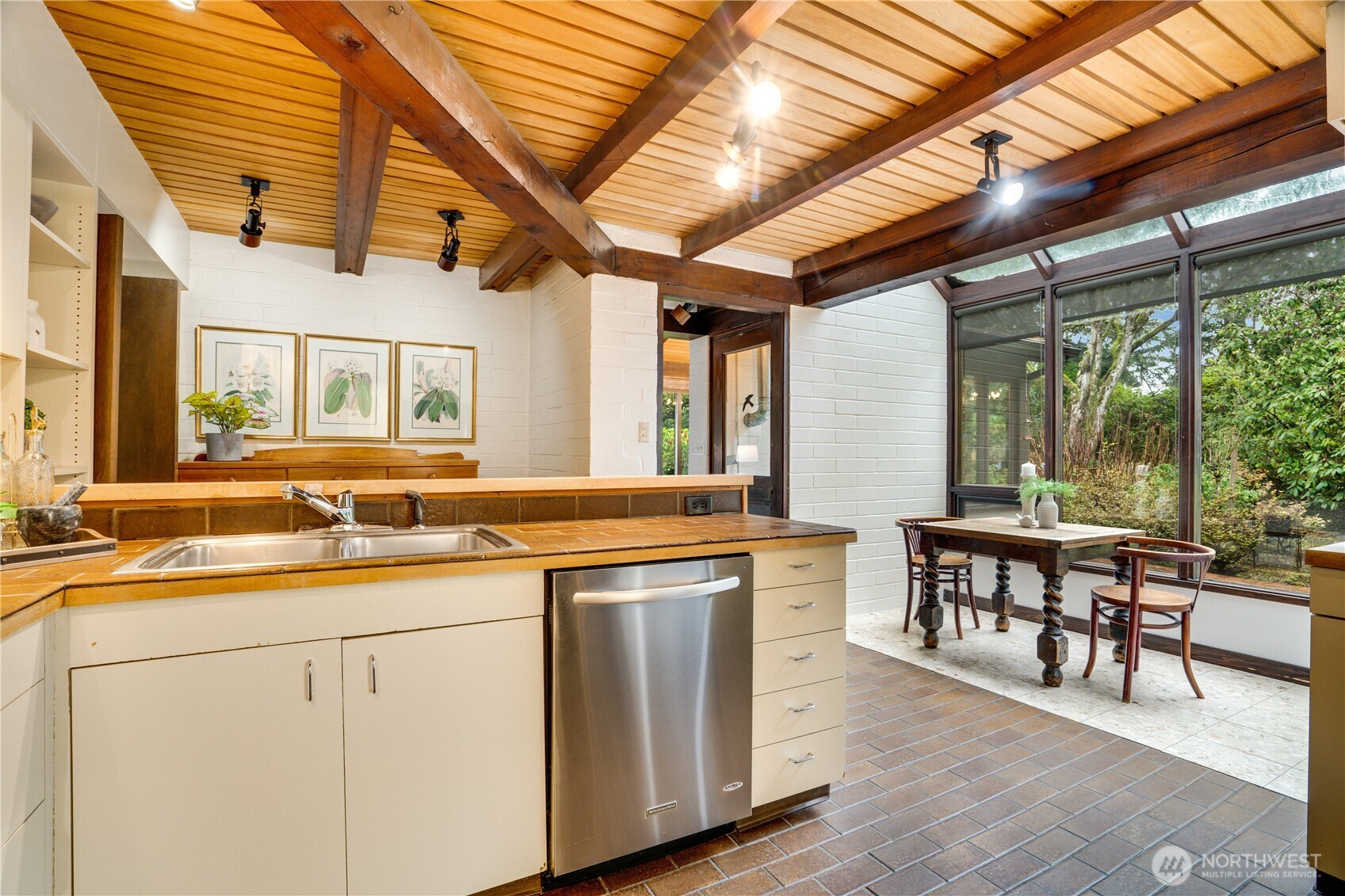 Lovely nook area in the kitchen looks over rear patio.