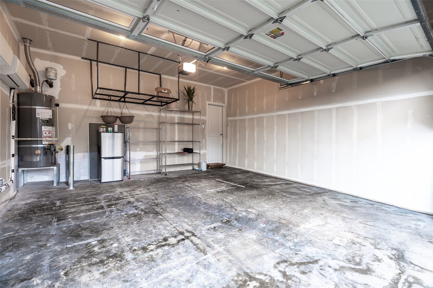 Large garage with ductless mini-splits for a temperate controlled garage!