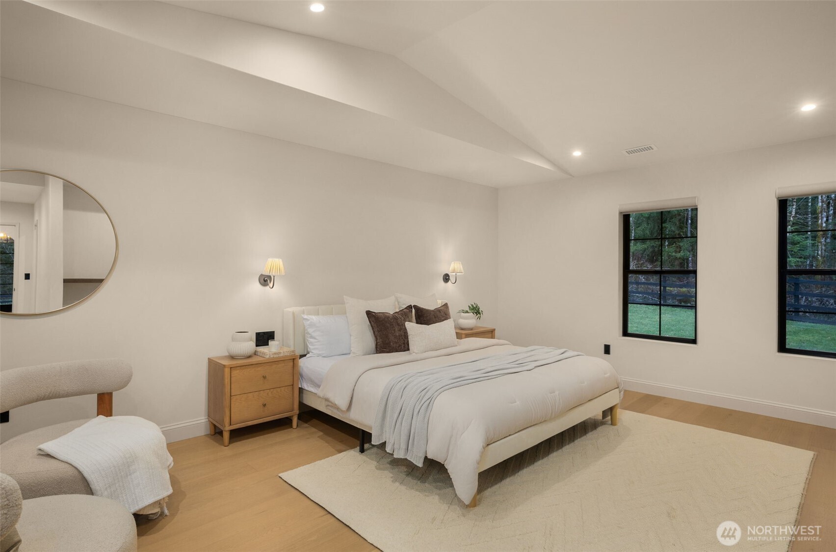 Primary suite has views of the tranquil estate